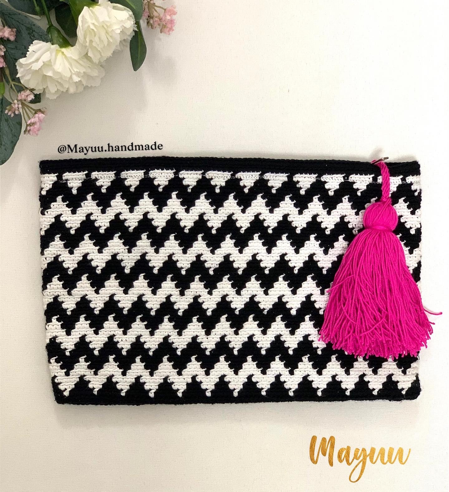 Tassel pop clutch